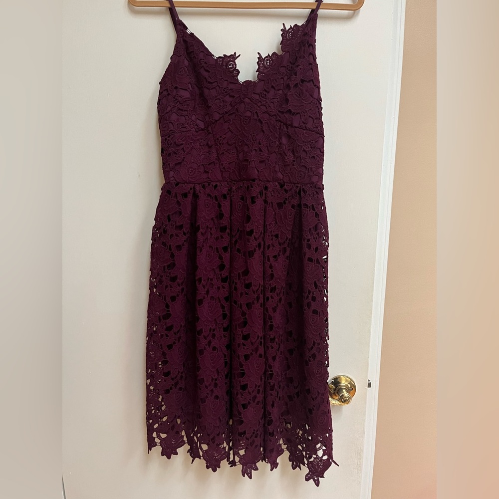 Aqua purple lace dress, hits just below the knee. Worn once,perfect condition